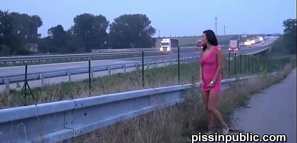  Naughty girls so desperate to empty their bladders that they are pissing next to busy roads